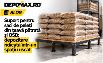 Suport jos pentru saci de peleți, realizat din țeavă pătrată neagră și OSB, într-un depozit uscat